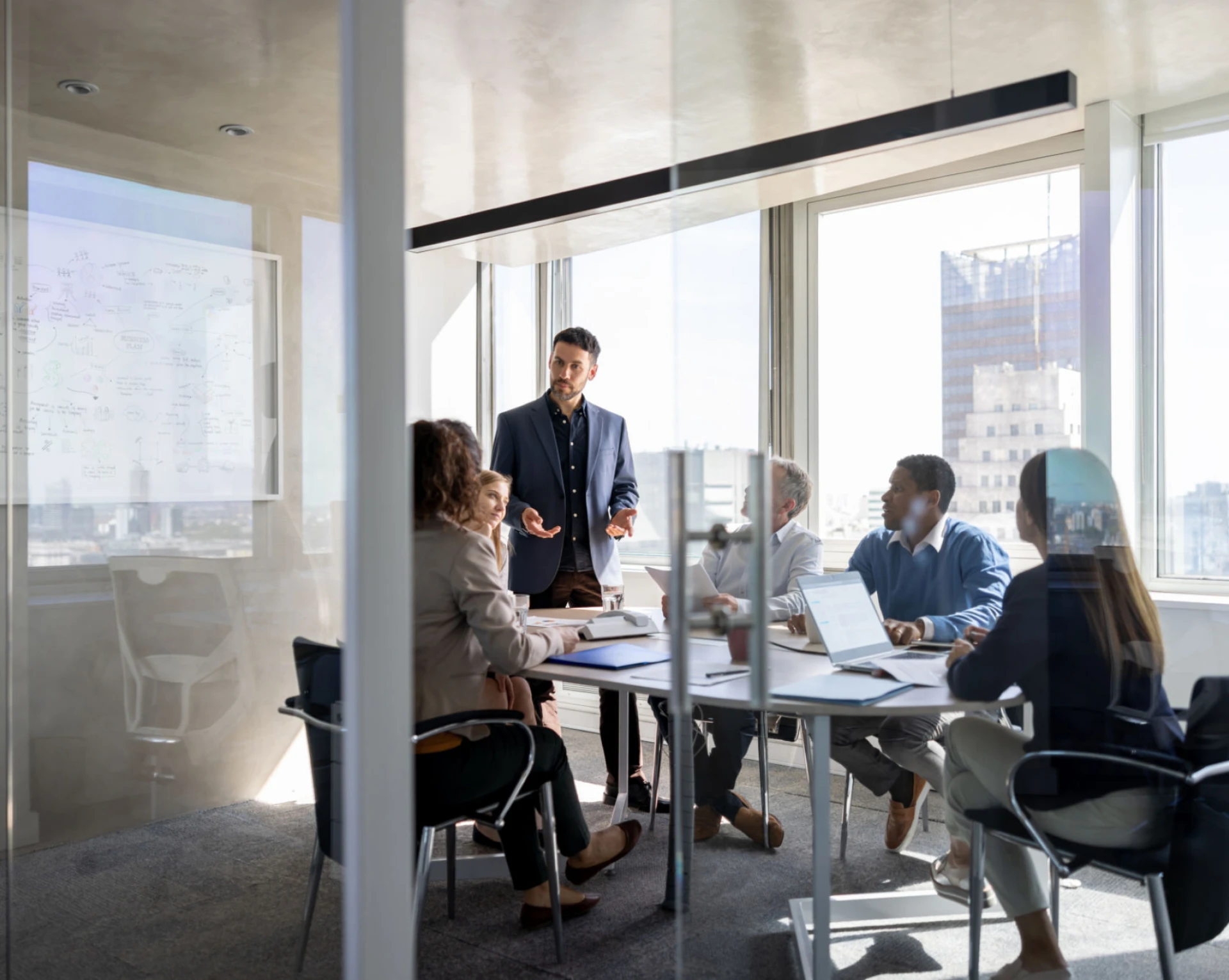 Business meeting in a modern conference room.